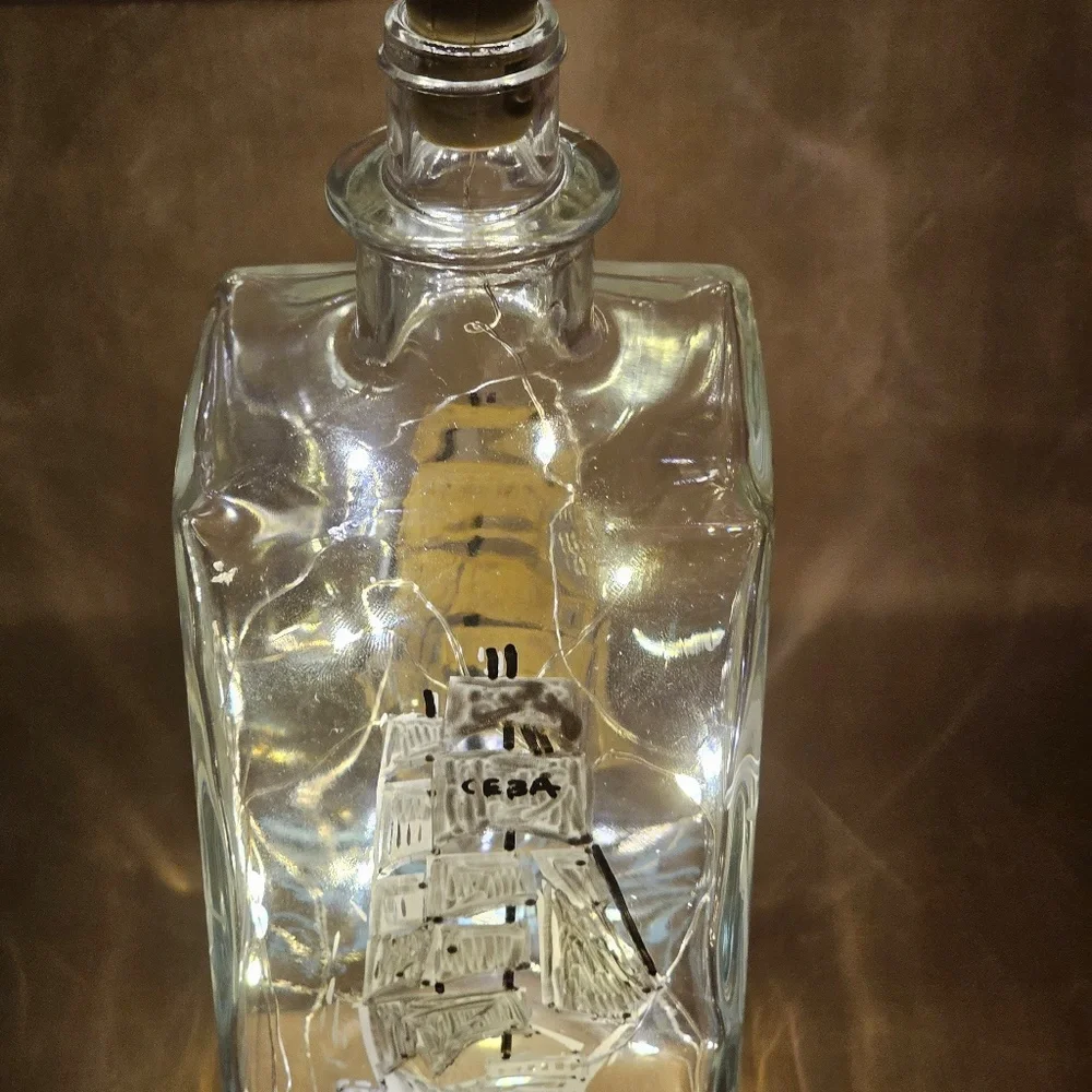 Liquor bottle with cork lights